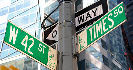 An image of New York street signs